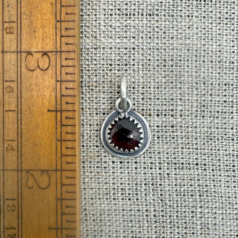 small rosecut garnet charm